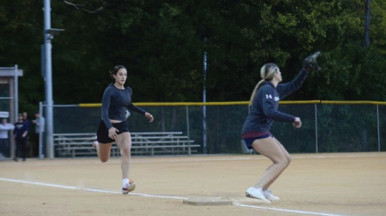 Softball Player Running to First